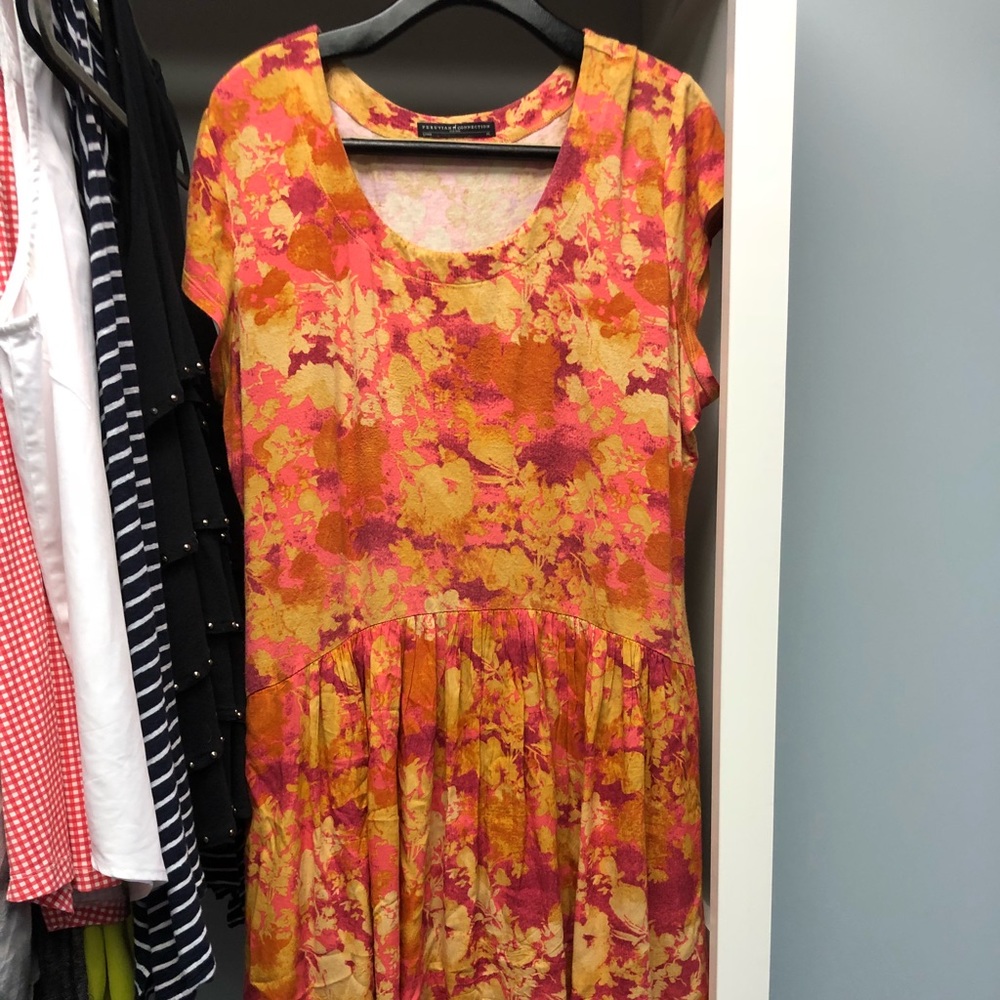 Orange multicolored cap sleeve swing dress.